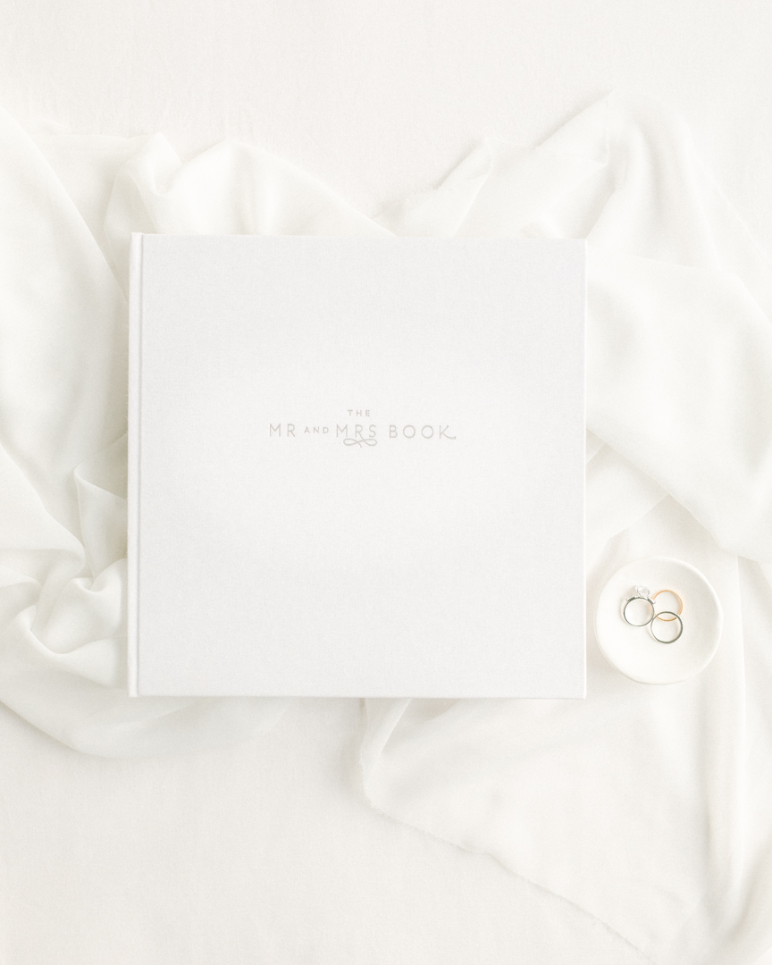 White prompted wedding guest book by the Mr and Mrs Book